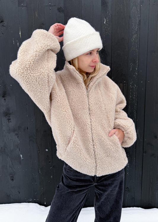 Beżowa kurtka z wełny merino Lana -zapinana na zamek, kieszenie, wysoki kołnierz. Aside